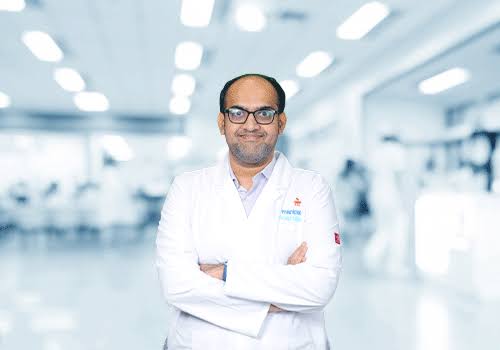 Dr Amit B